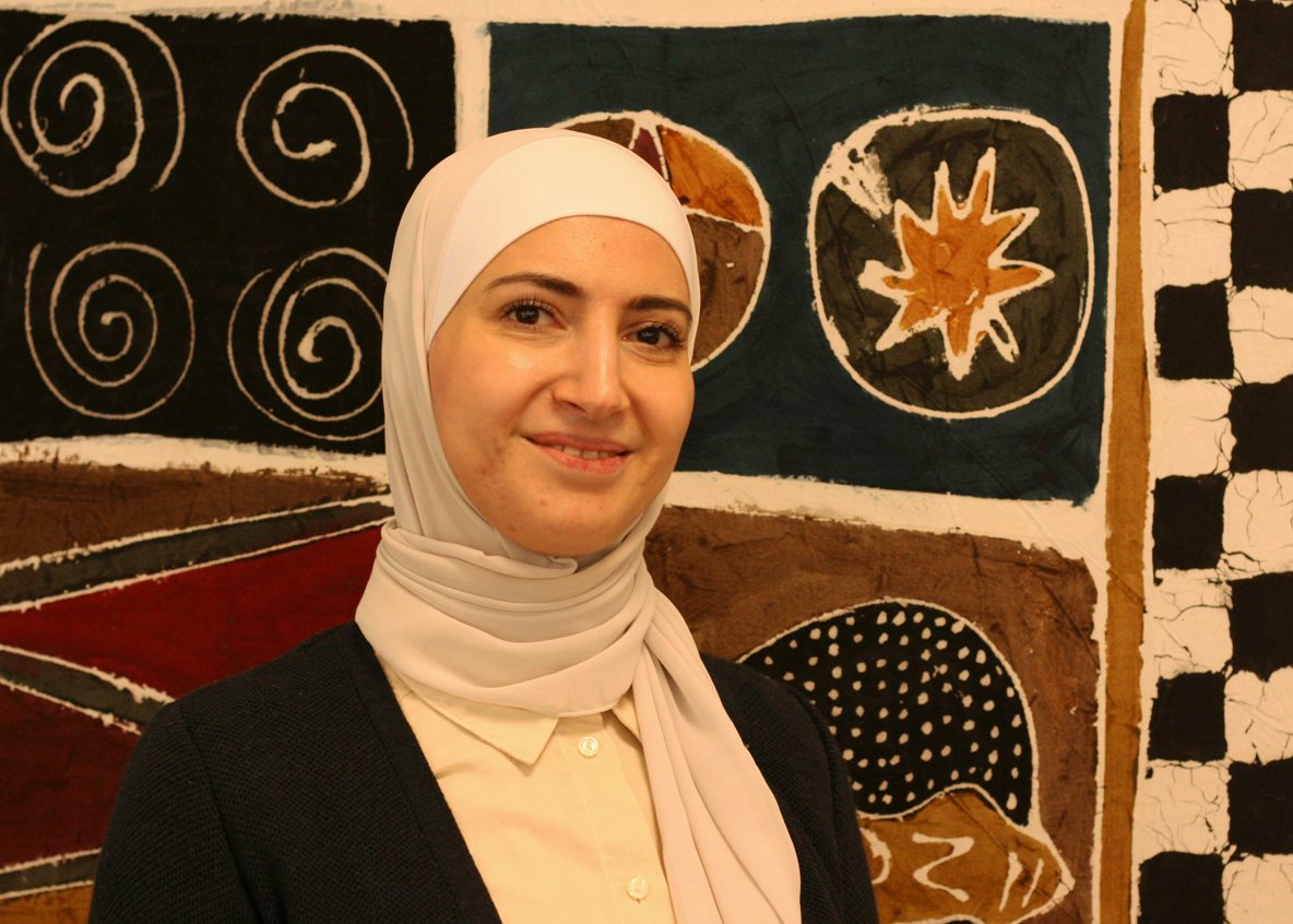 En person ler mot kameran.